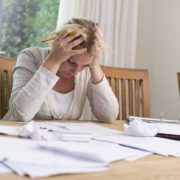 Woman burdened with tax debt